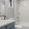 a bathroom with a sink toilet and bathtub