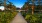 landscaped walkway leading to pool