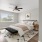 A bedroom with a bed and a view