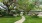 walking path along well manicured lawns and landscaping