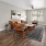 spacious living room with ceiling fan