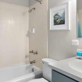 Spacious bathrooms with everything you need shower/tub combo in bathroom