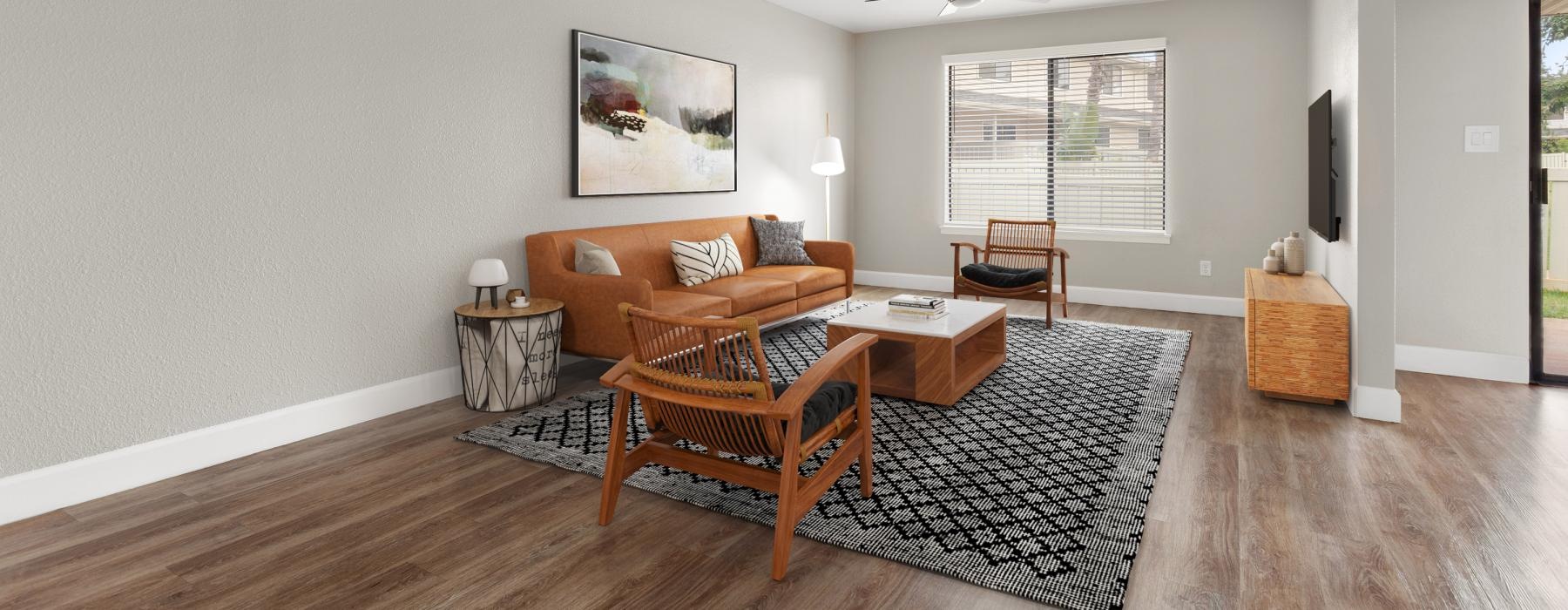 spacious living room with ceiling fan